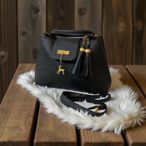 Elegant Black Handbag with Gold Accents